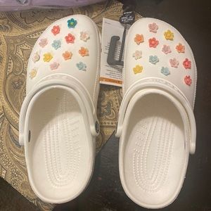 New white crocs with charms